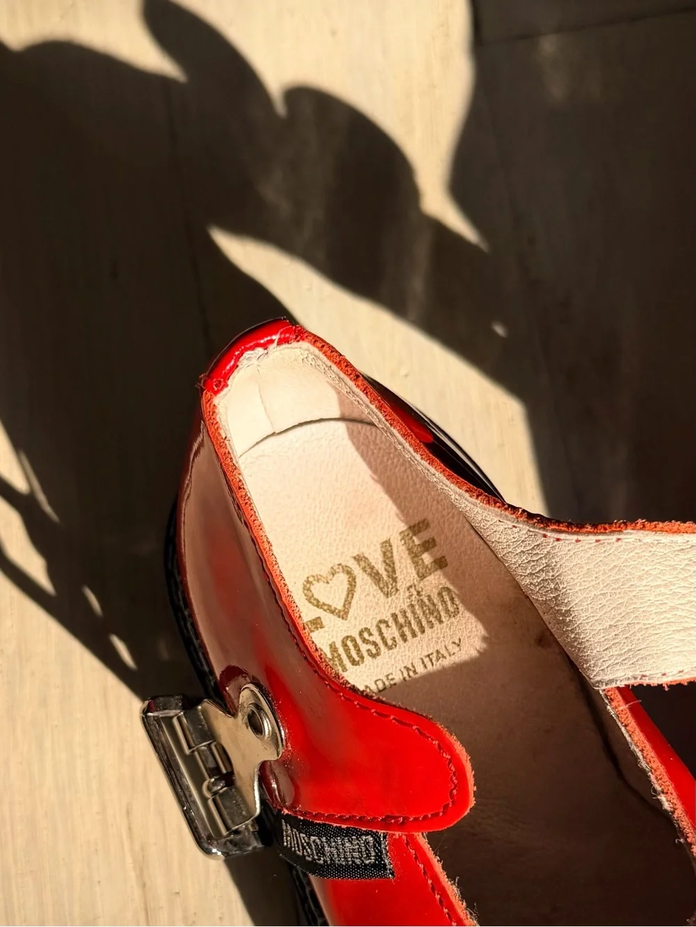 MOSCHINO Red Patent Mary Jane Shoes with Smile Charm